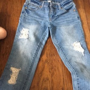 Ripped jeans lace underlay